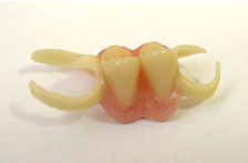 Частичные съемные зубные протезы: виды
